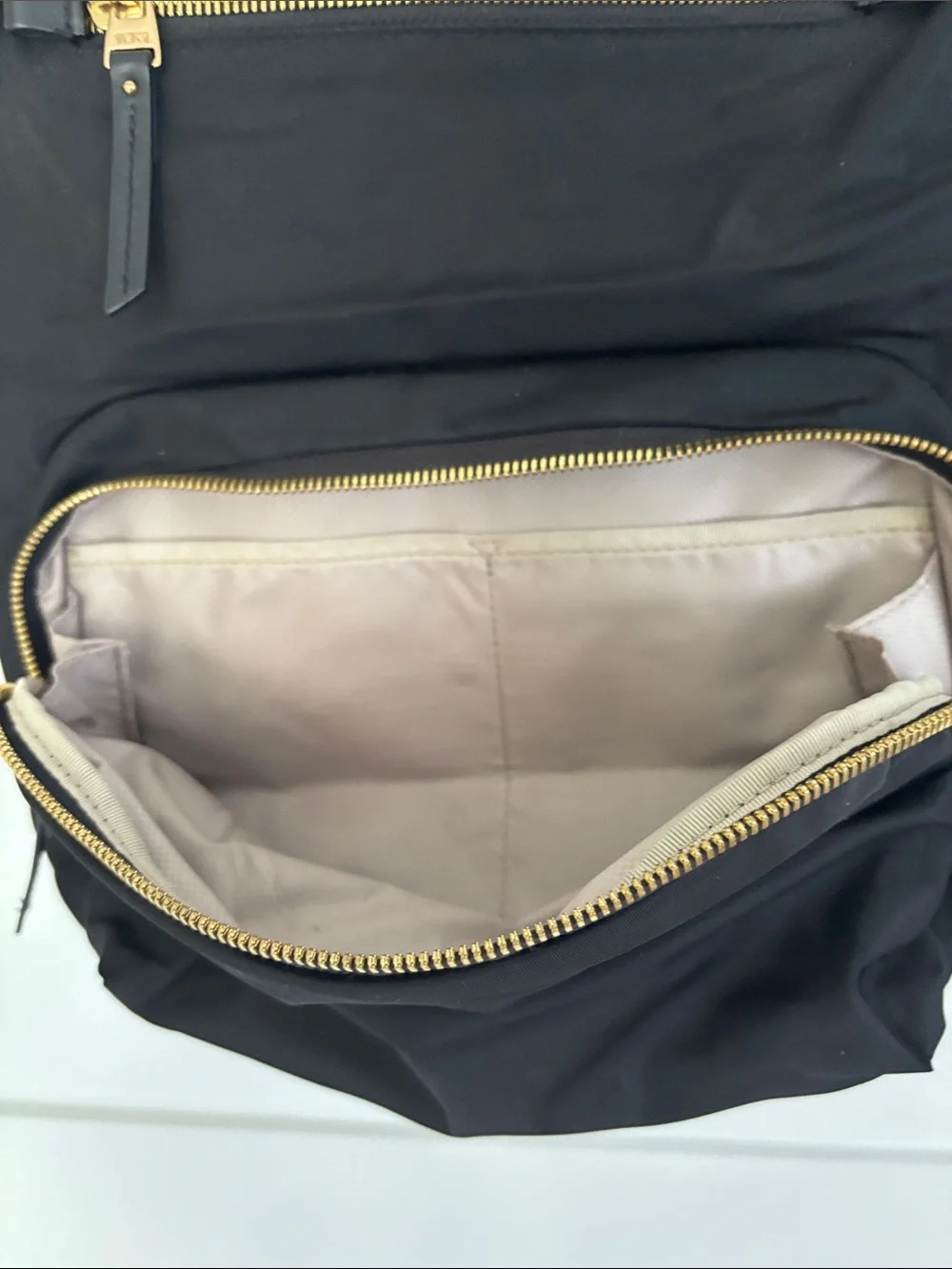Tumi Voyaguer Halle Black Nylon Backpack with Gold Hardware Accents